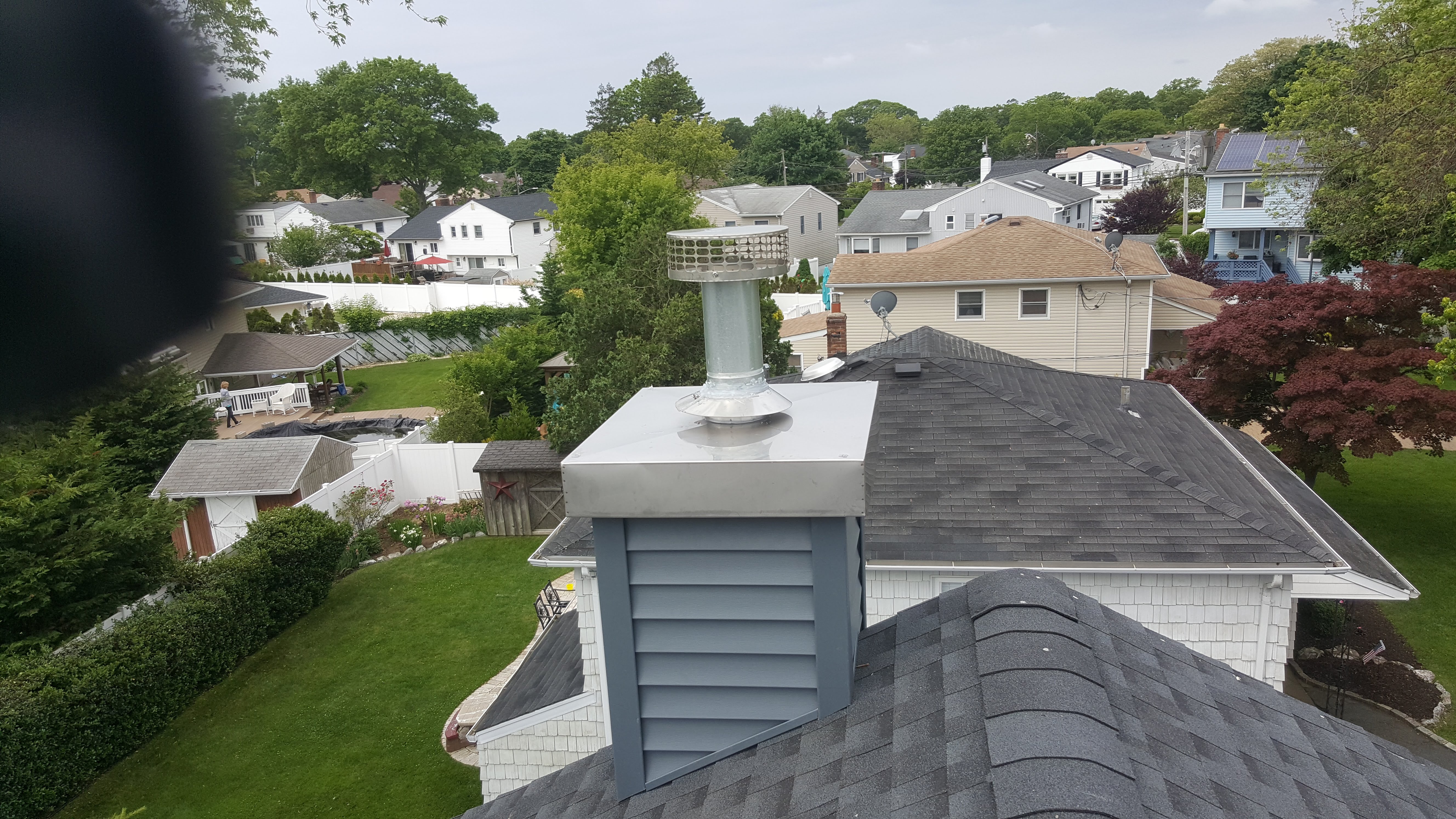 Complete chimney crown rebuild and waterproofing in Garden City, New York