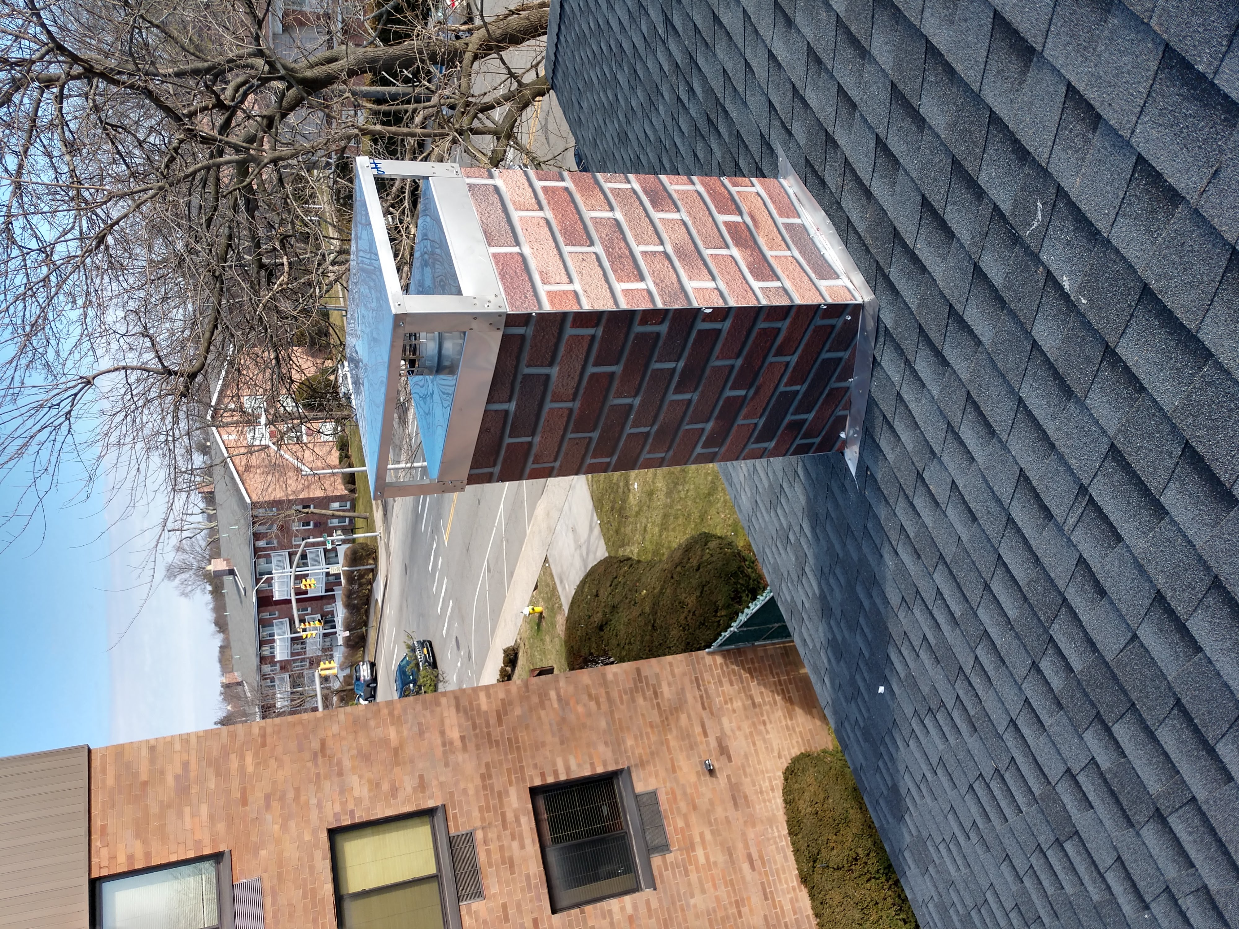 New elastomeric sealant applied to chimney crown in Garden City, NY